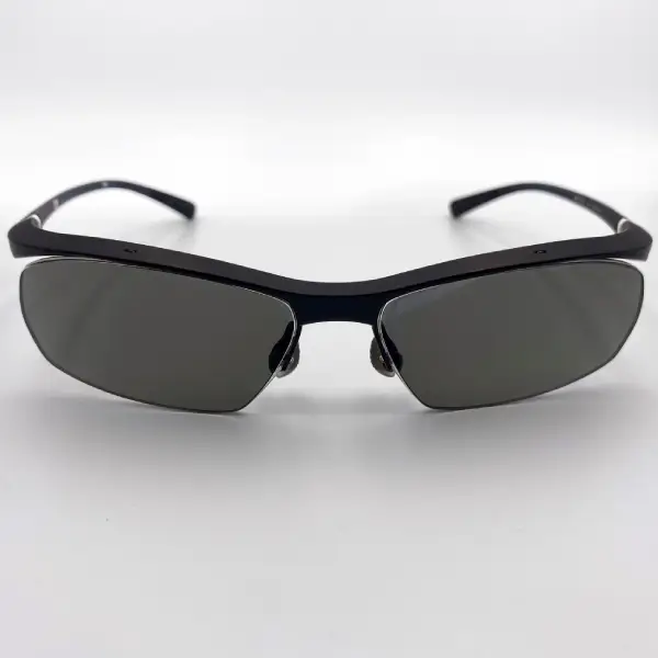 กรอบแว่น Nike เลนส์ Essilor 1.60 Varilux comfort max Transitions Grey2